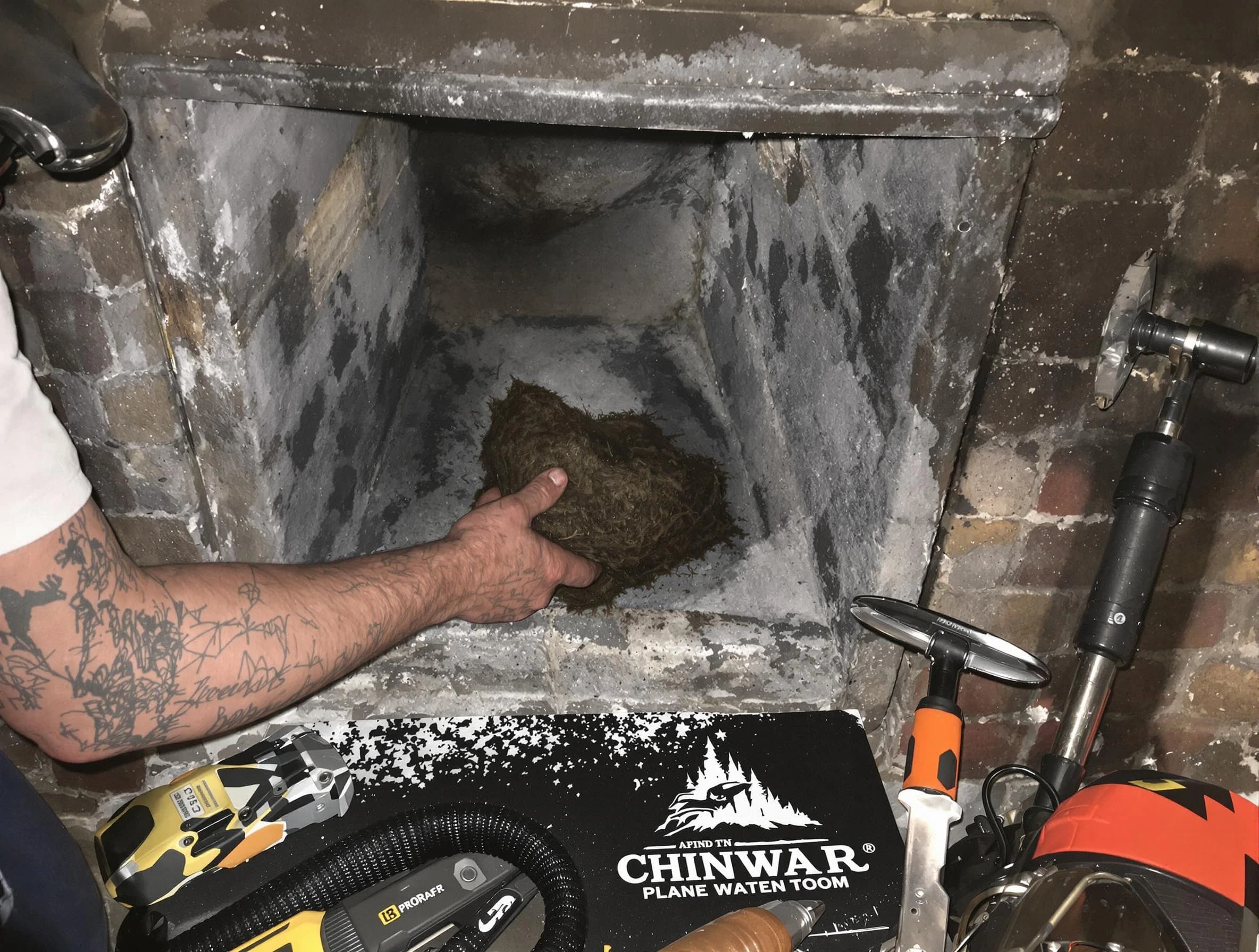 Cullman Chimney Sweep safely removing debris and screening chimney in Cullman, AL