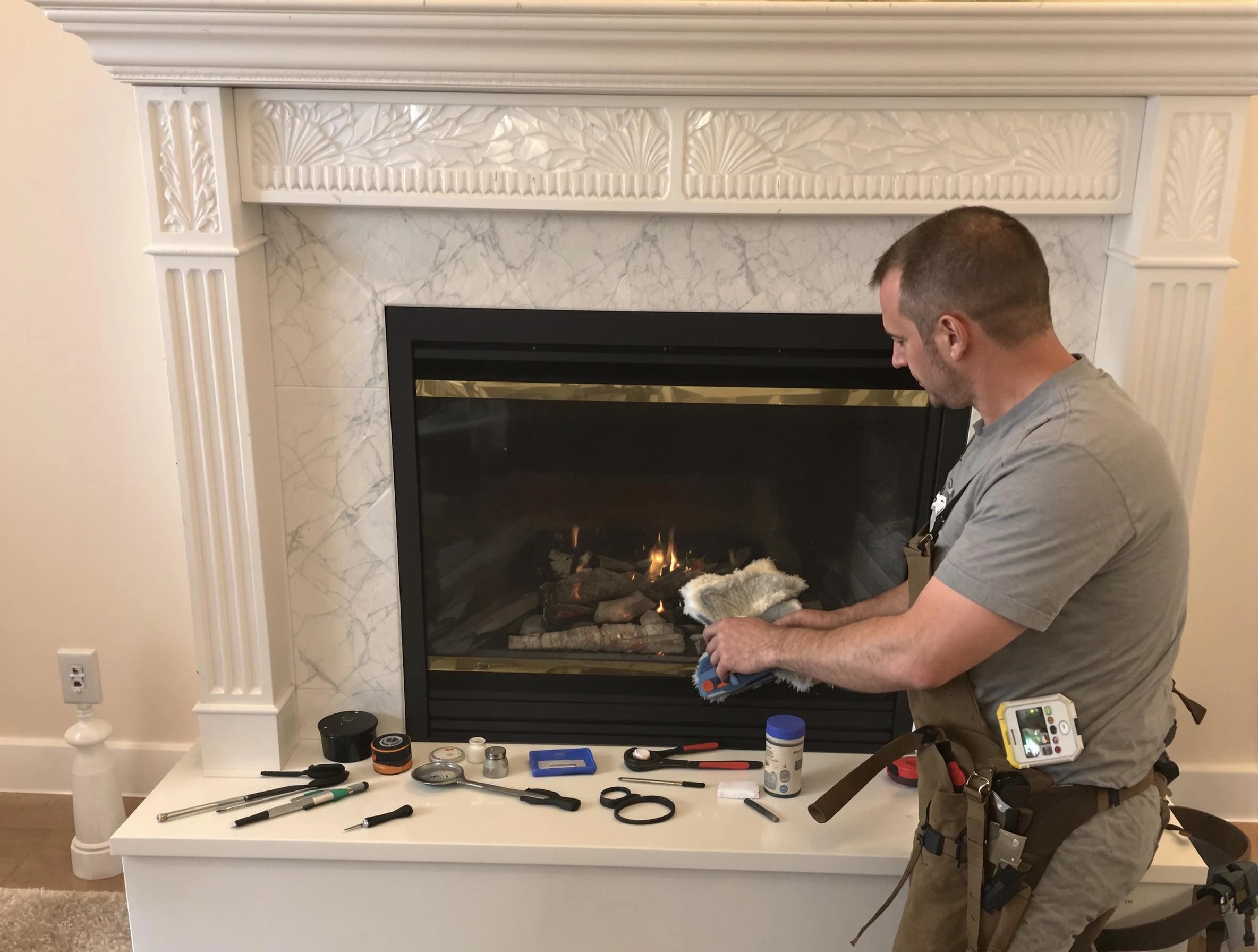 Cullman Chimney Sweep performing fireplace maintenance in Cullman, AL